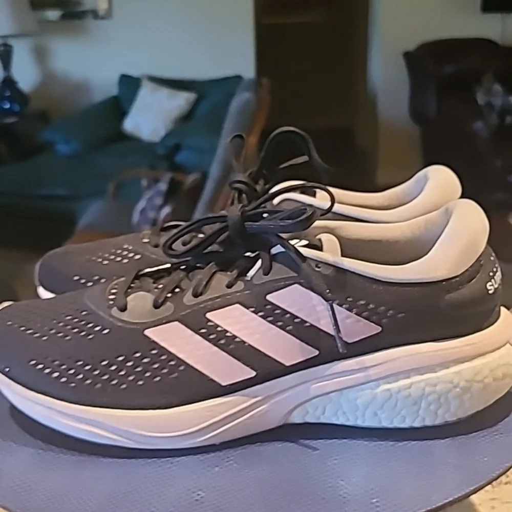 Adidas Supernova womens athletic shoes sz. 10. Black /purple. EC.(#1165)